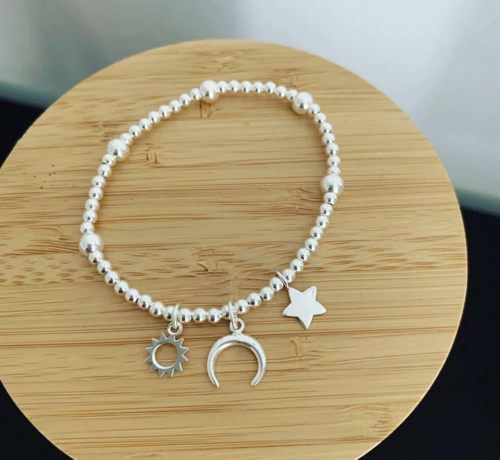 Bracelet p3mm & soleil:lune:étoile 53€